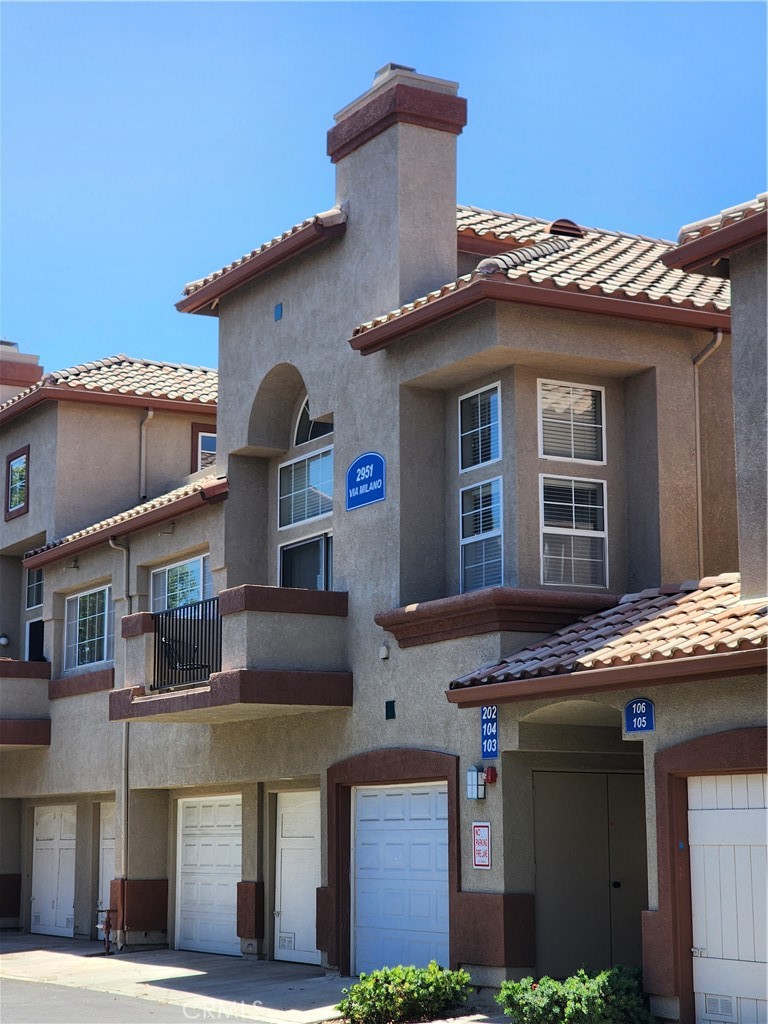 a front view of a house with balcony