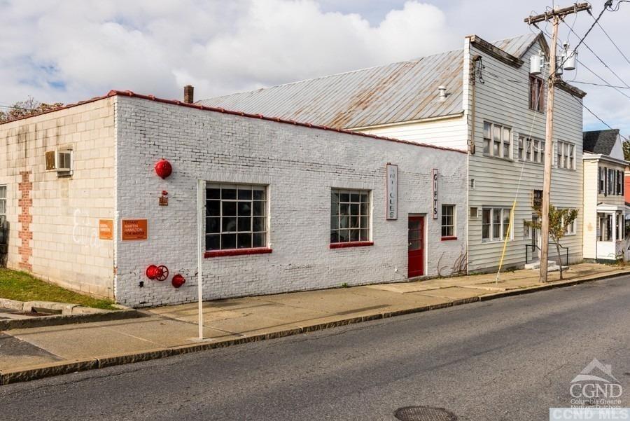 a view of street along with house