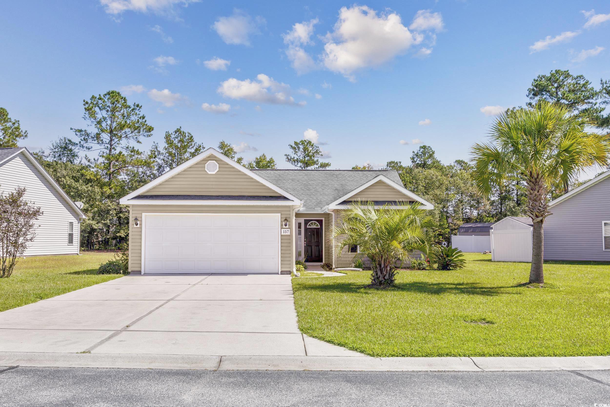 View of front of home featuring a front yard and a