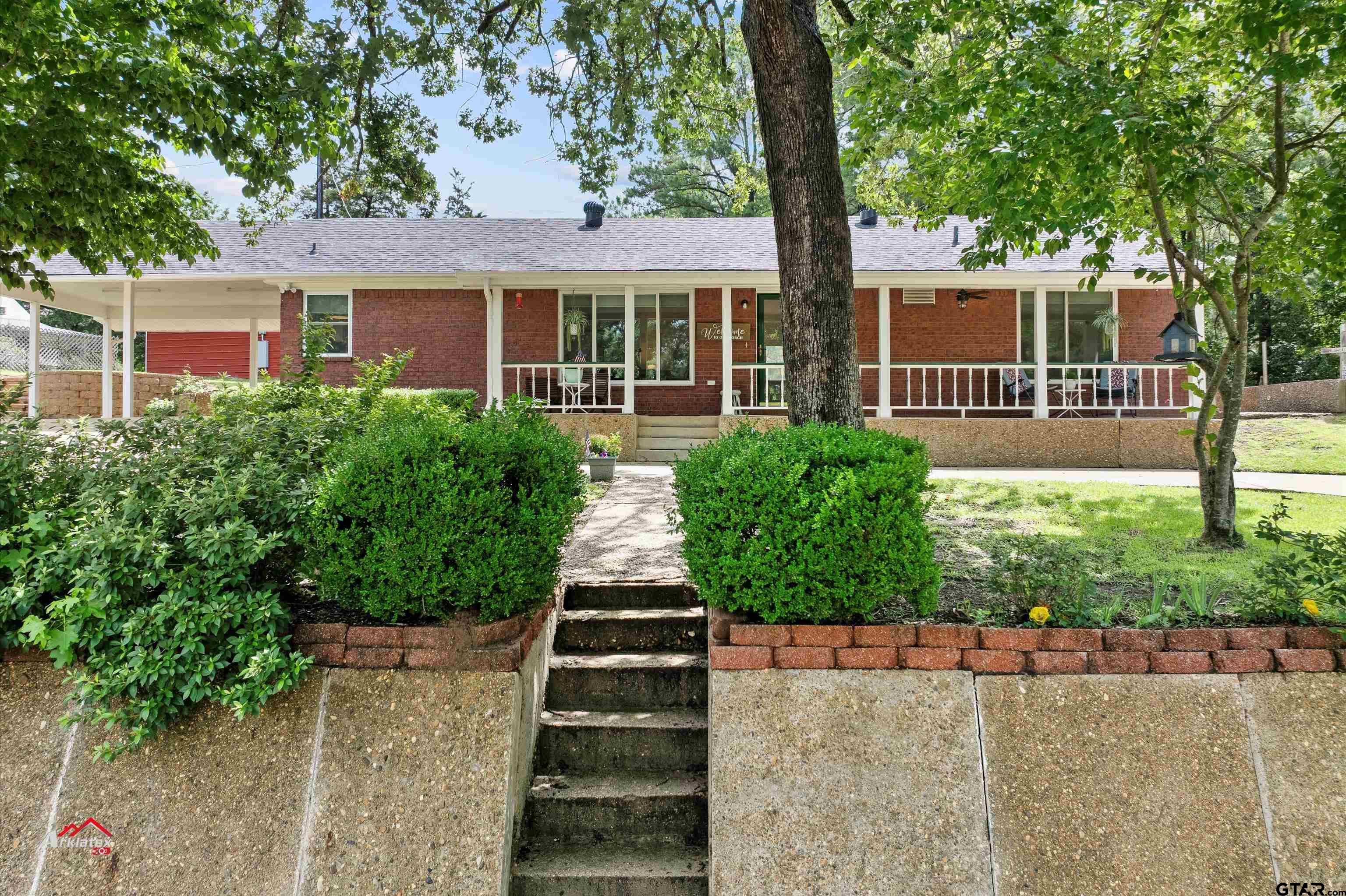 front view of a house with a yard