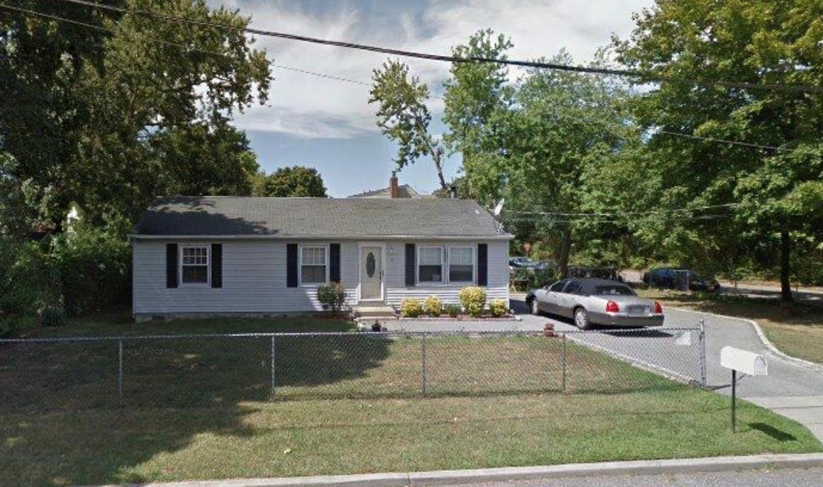 a house view with a garden space