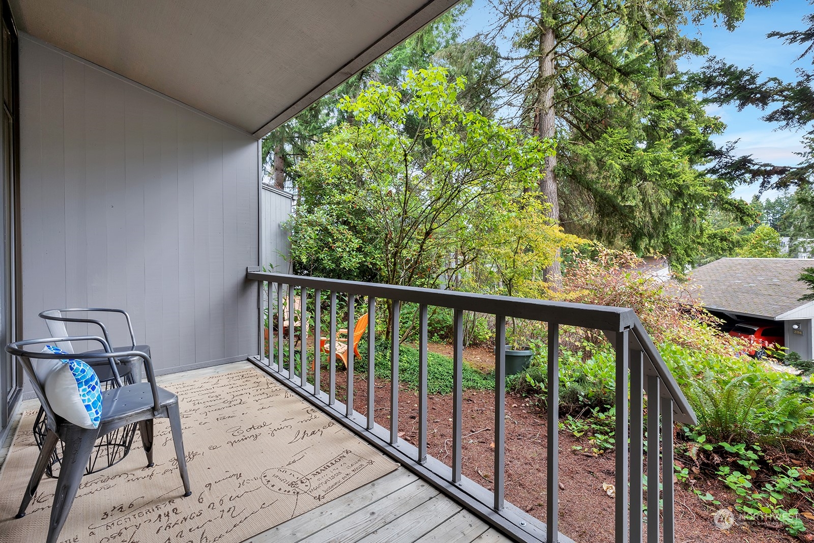 a view of a balcony with furniture