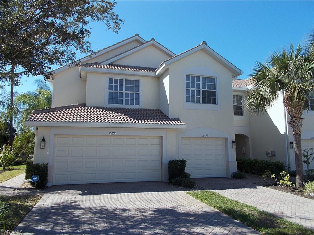 a front view of a house with a garage