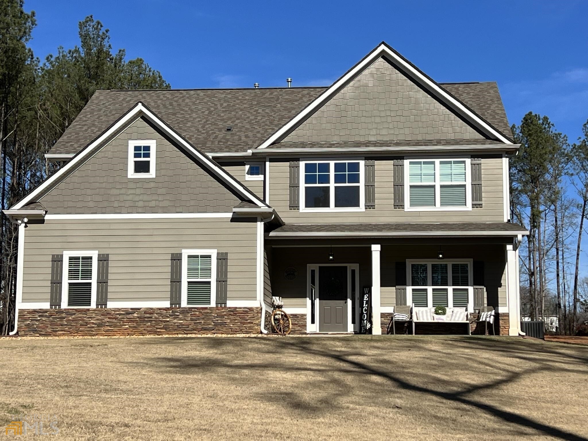 front view of a house with a yard