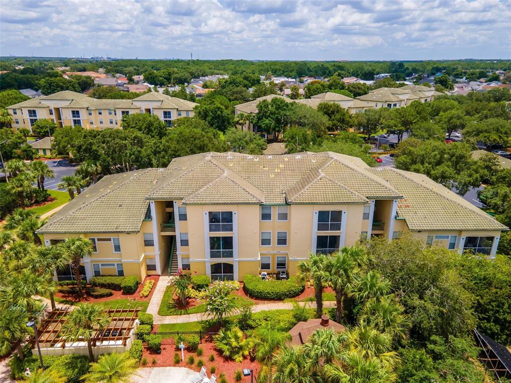 an aerial view of a house with a garden