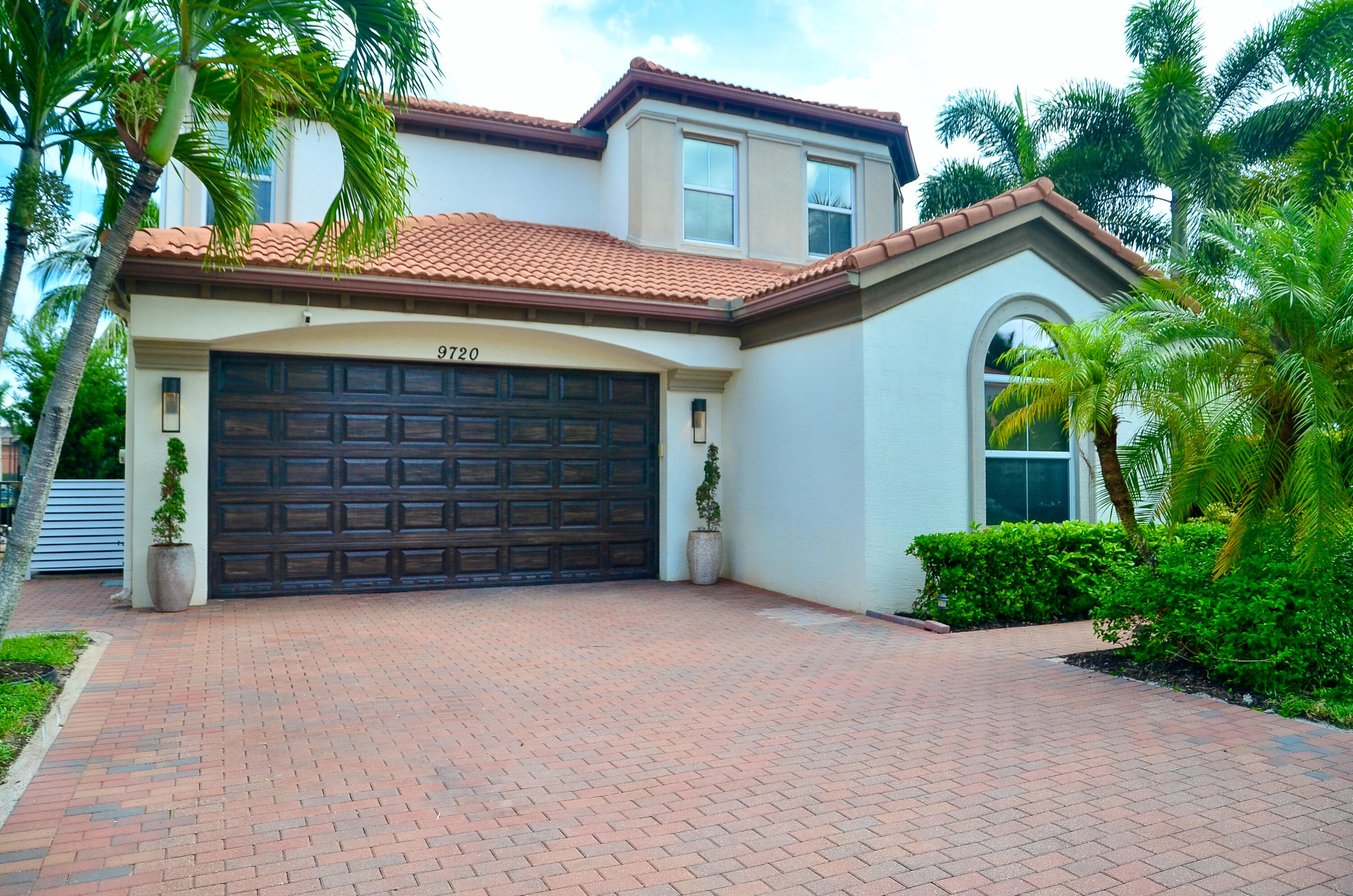 a view of a house with a garage