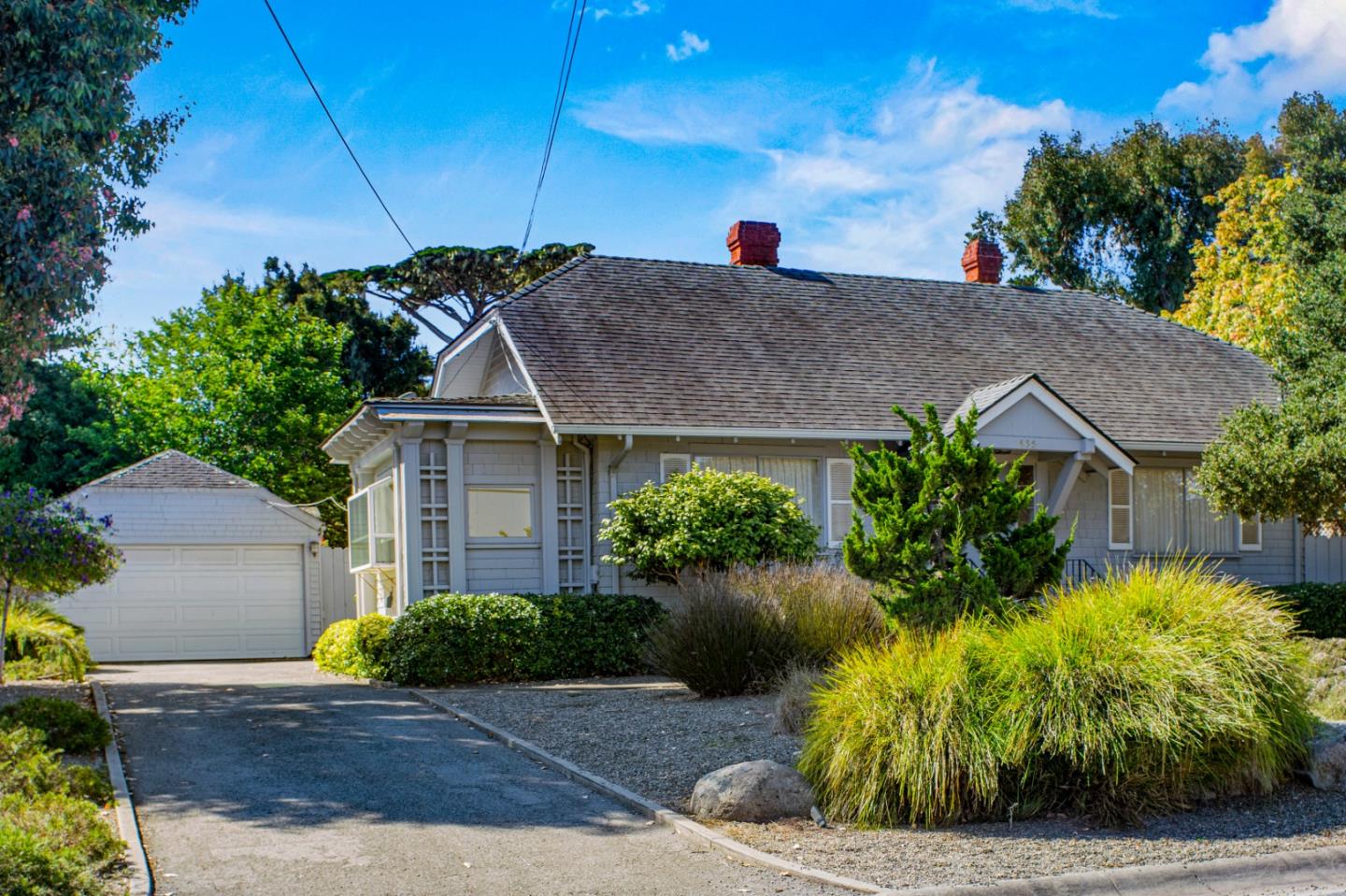 a house view with a garden space