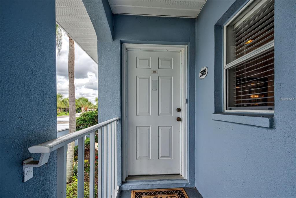 a view of a balcony and toilet