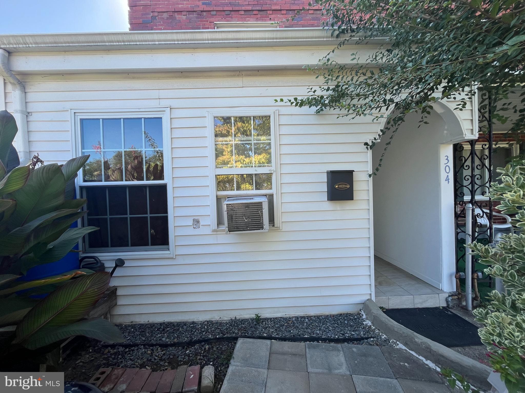 a front view of a house with a garage