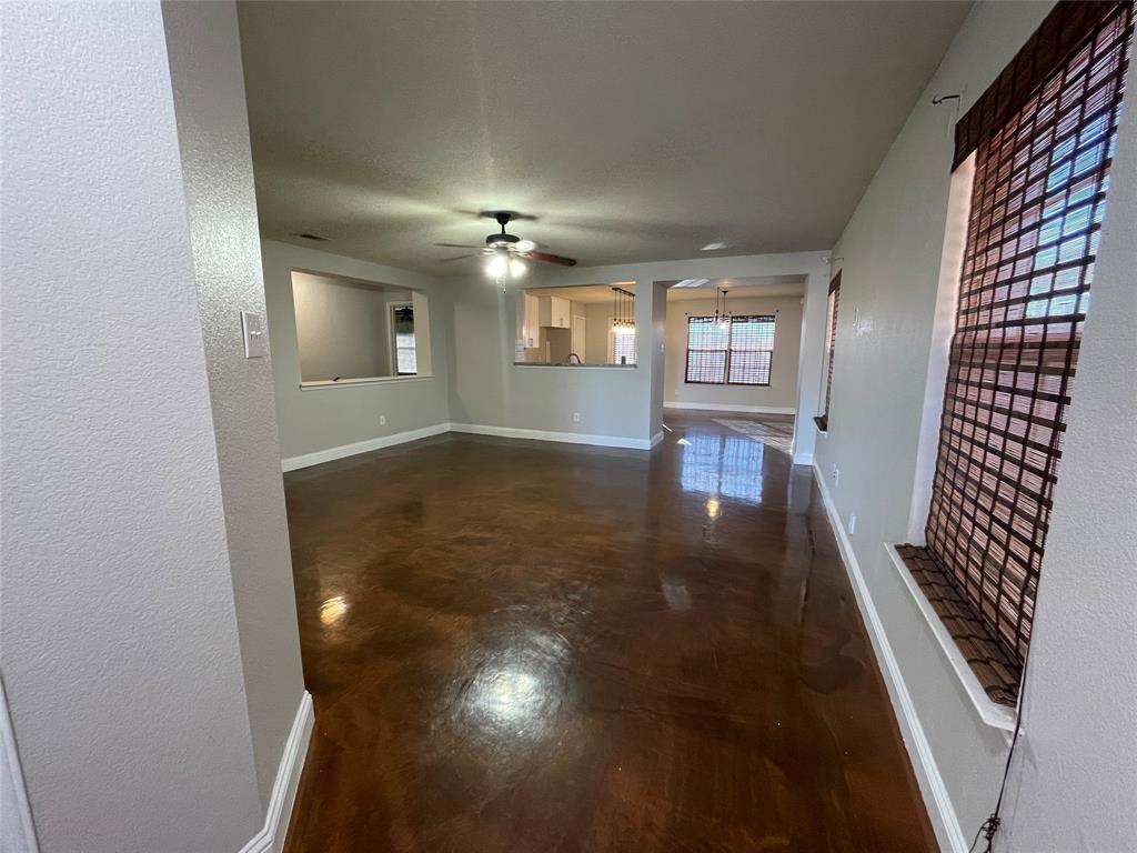 wooden floor in a hall with an entryway