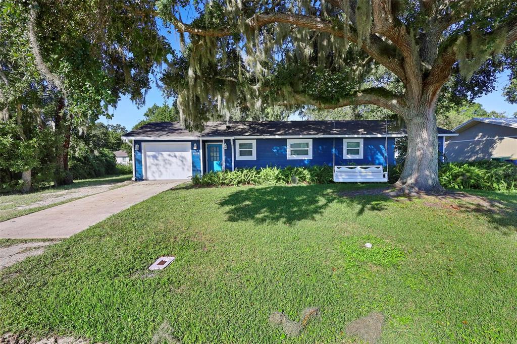 front view of a house with a yard