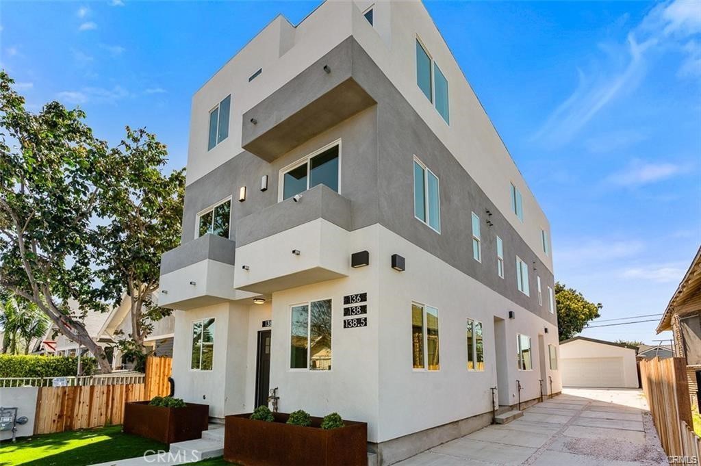 a front view of a large white building