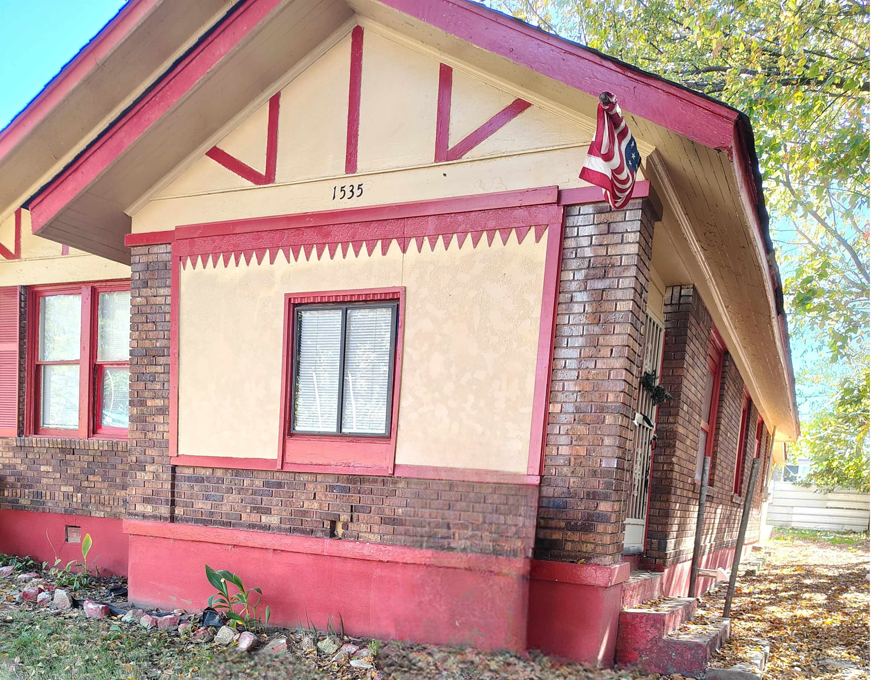 a front view of a building with an outdoor space