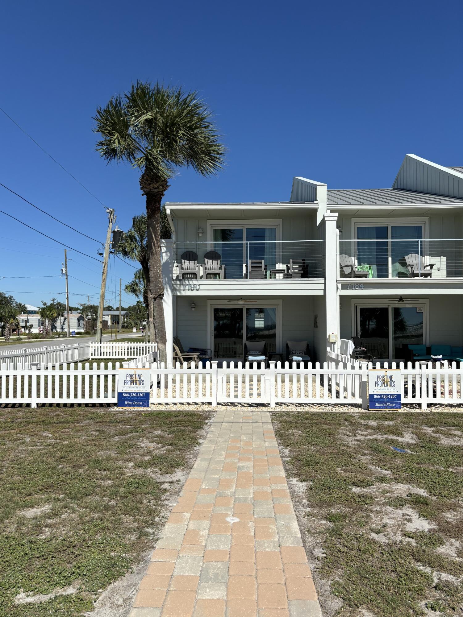 a front view of a house with a swimming pool