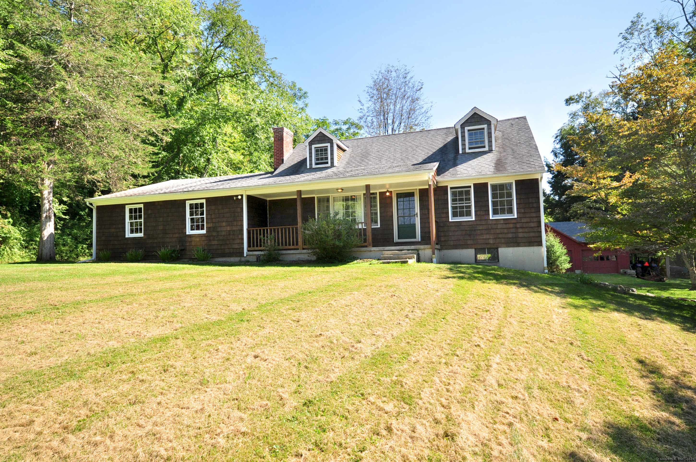 a view of a house with a swimming pool