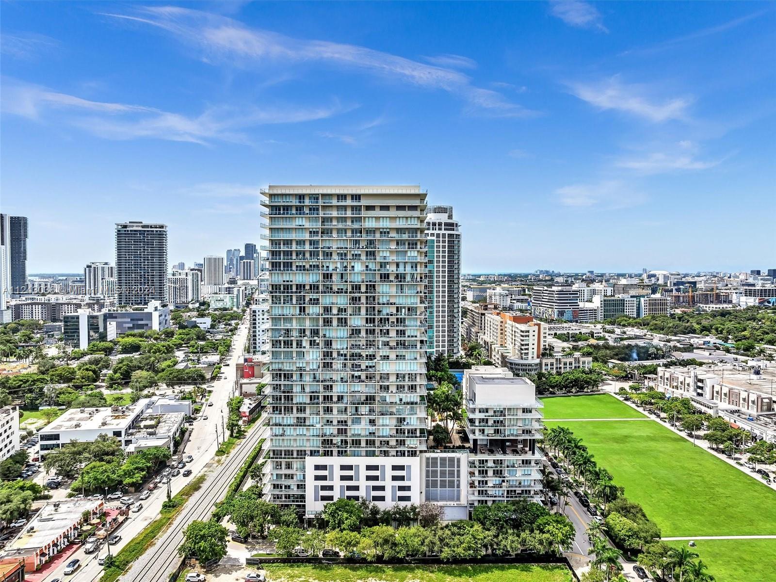 a view of a city with tall buildings