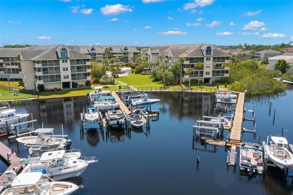 a view of a lake with outdoor seating