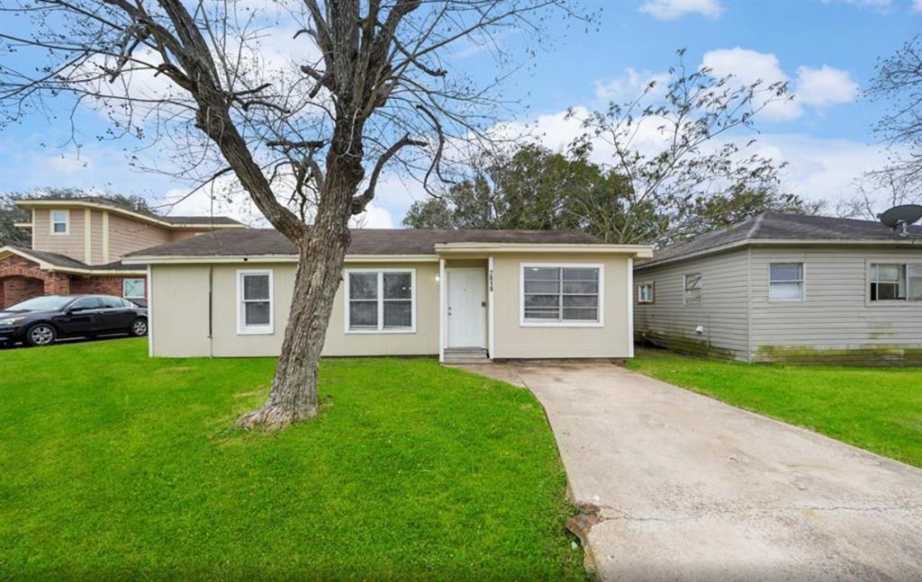 front view of a house and a yard