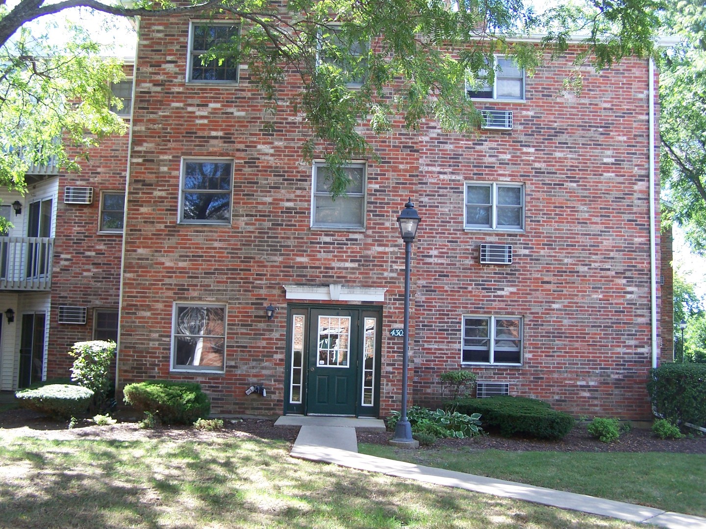 a brick building with a large windows