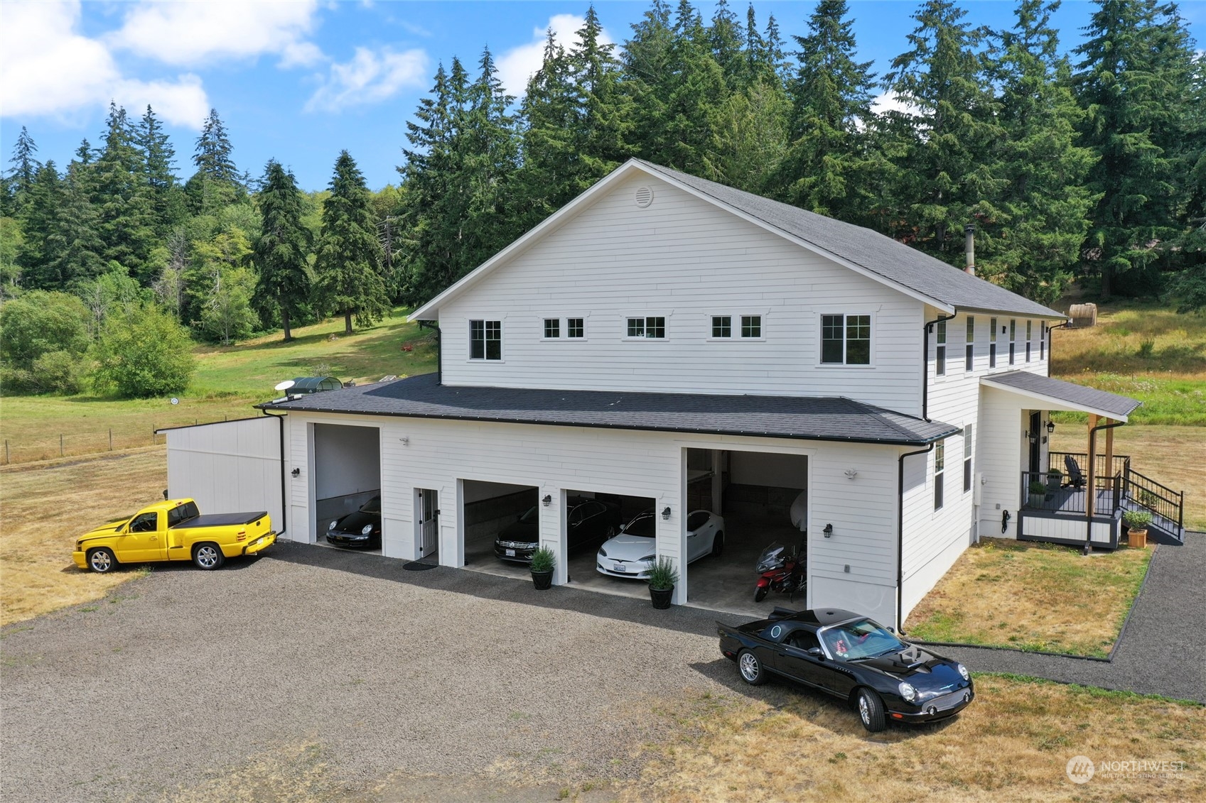 a view of a car park in front of house