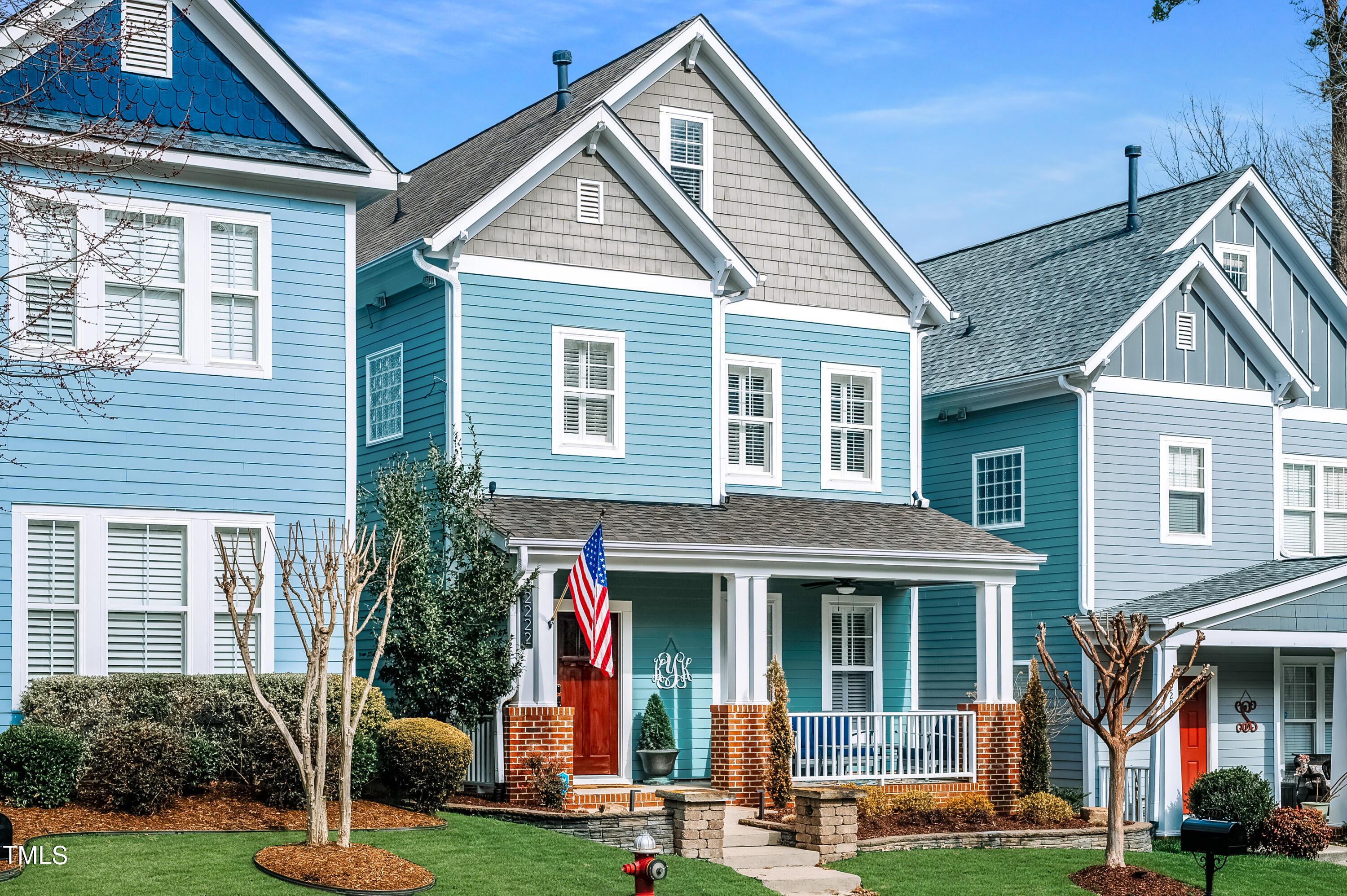 front view of a house with a yard