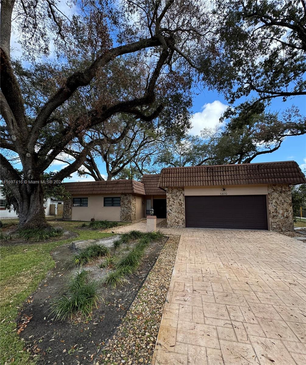 a house view with a outdoor space