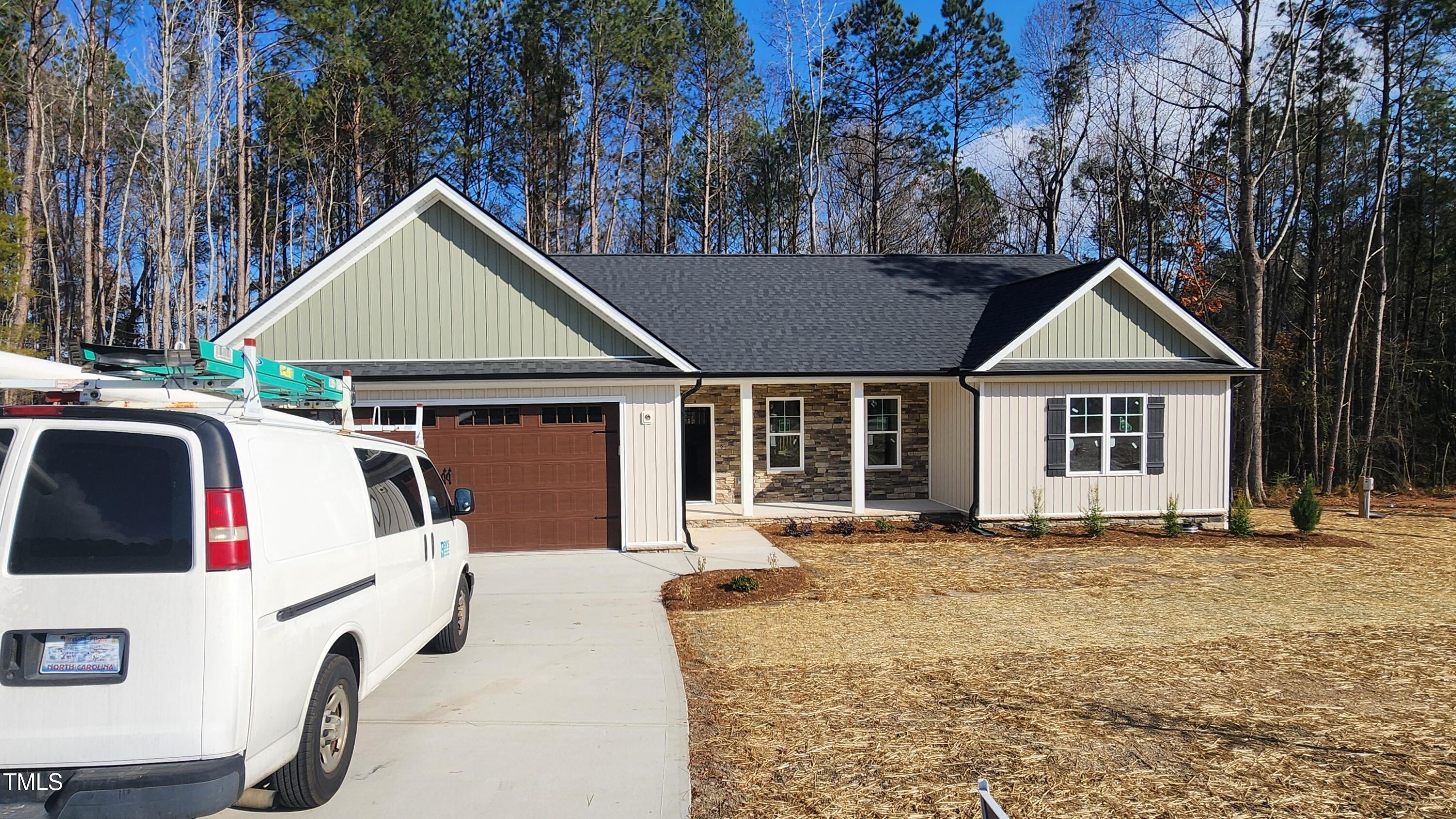 a front view of a house with a porch