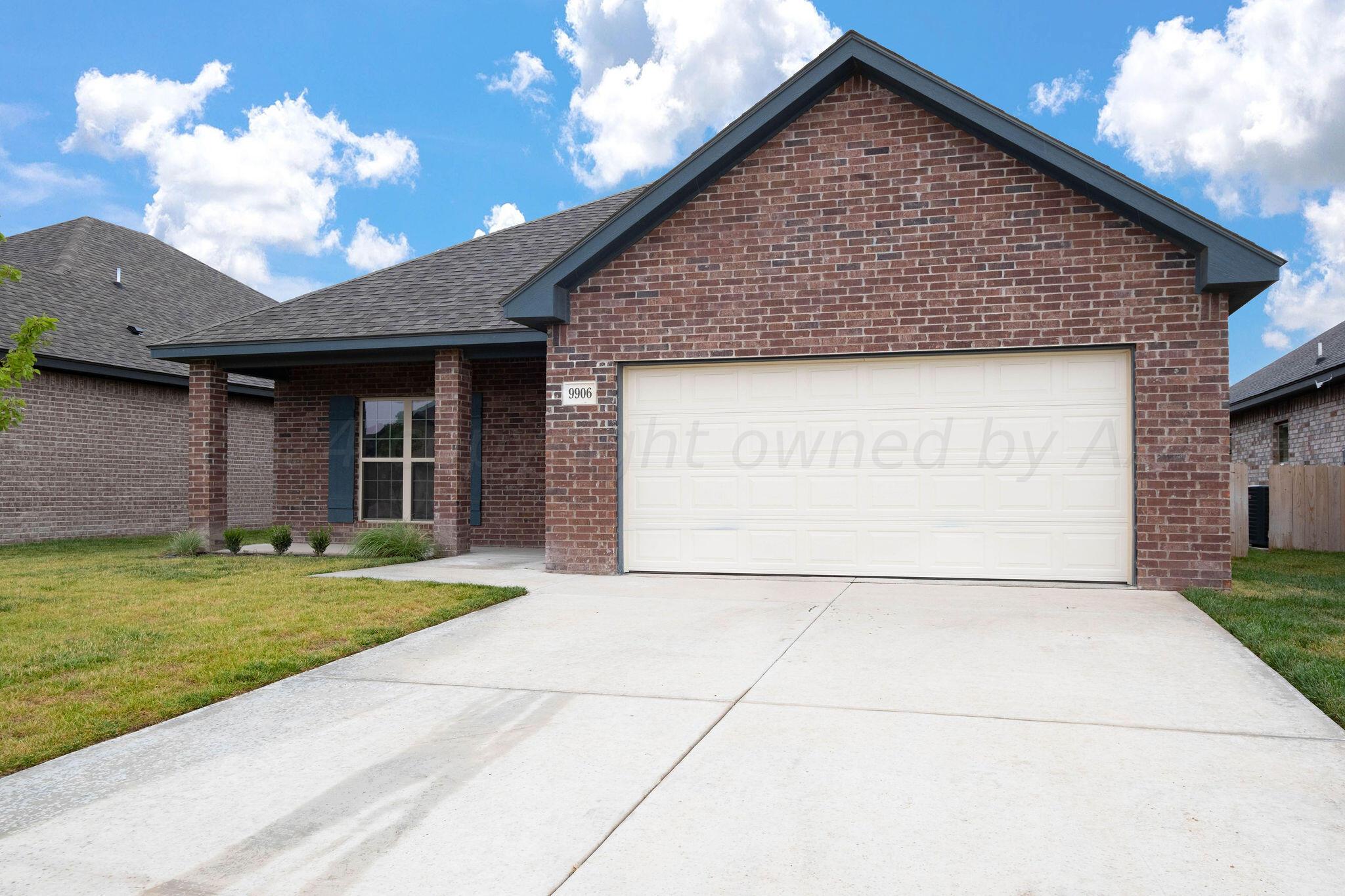 a front view of house with yard