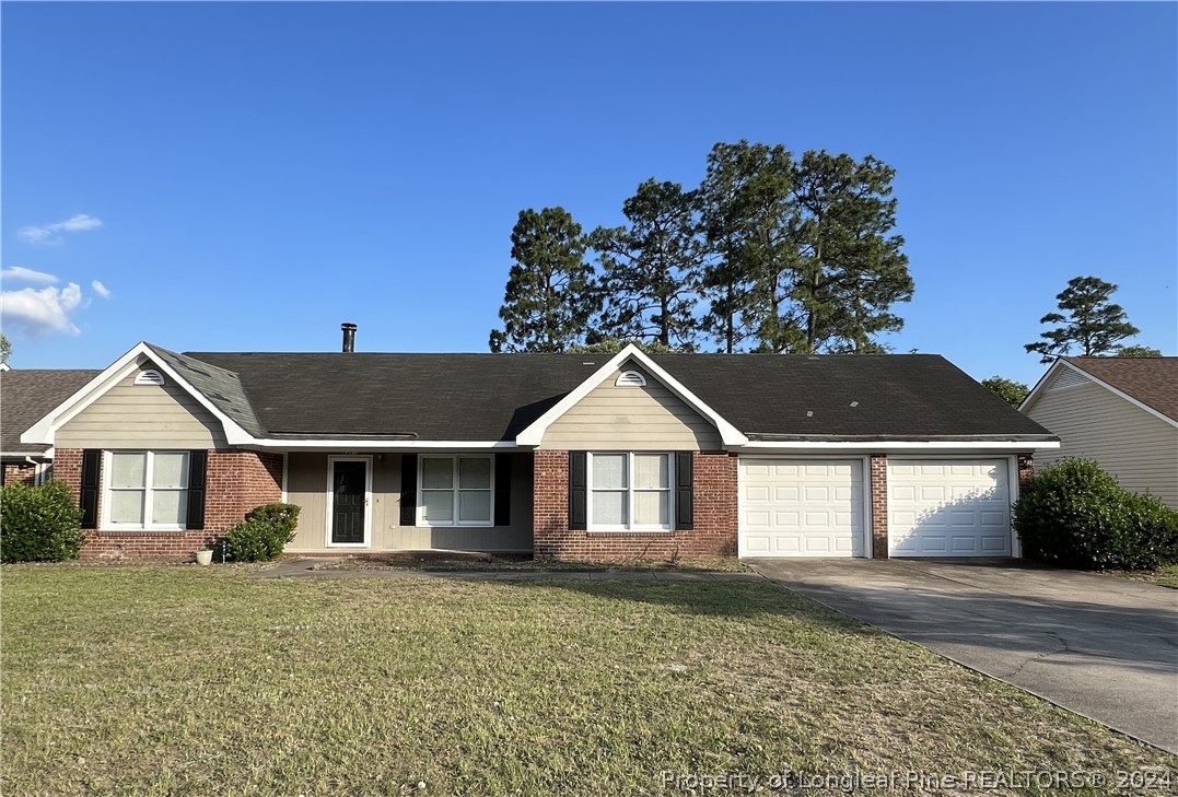 front view of a house and a yard