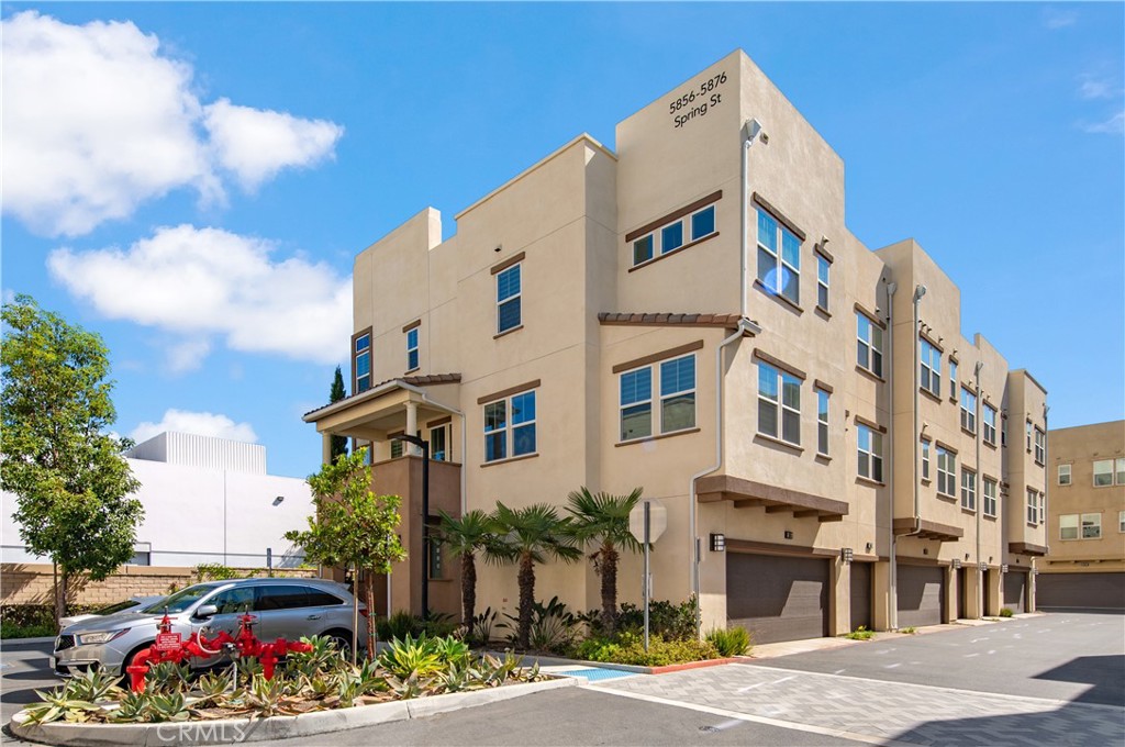 a front view of a building with street view