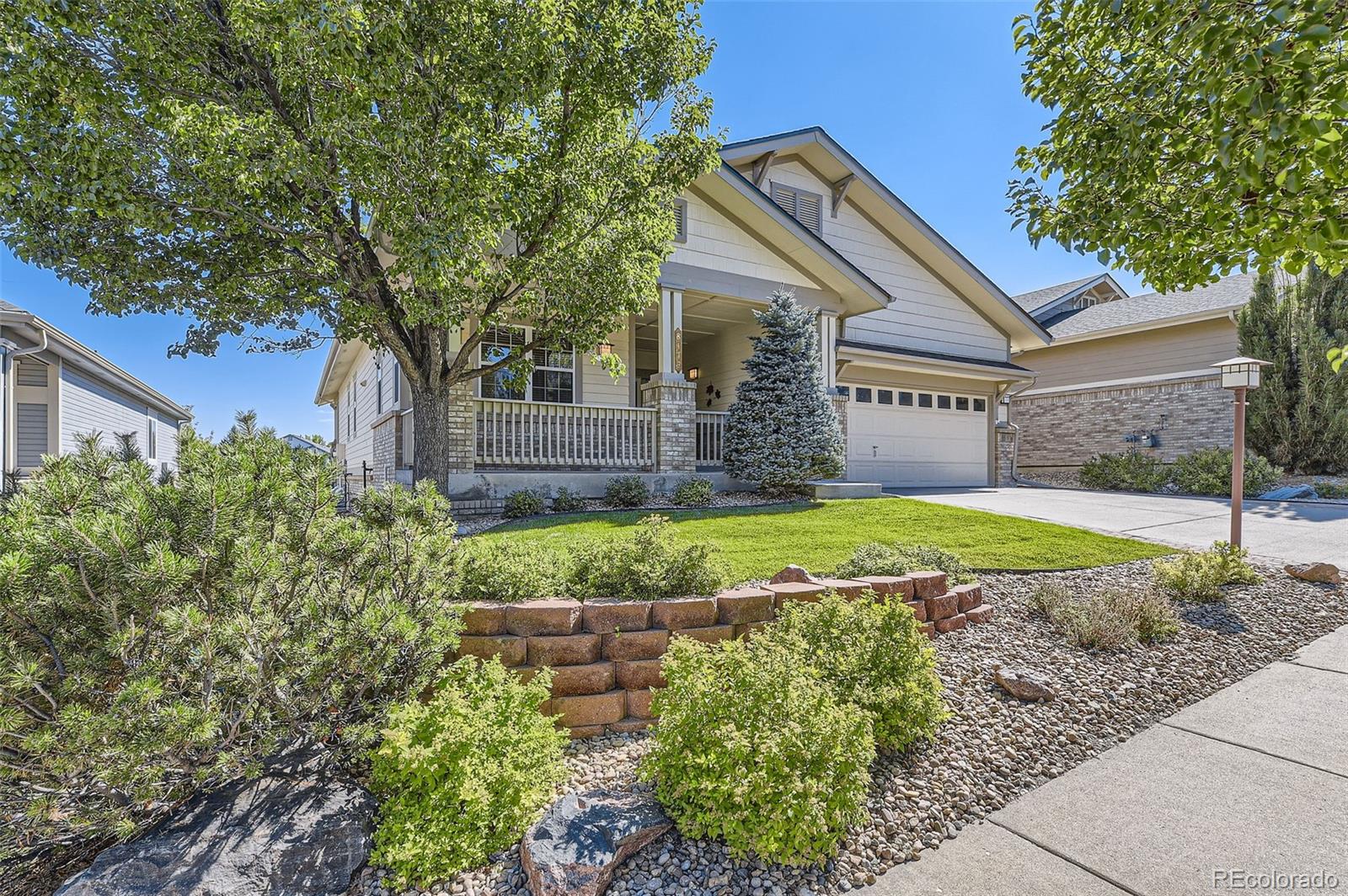 a view of house with a yard outdoor seating