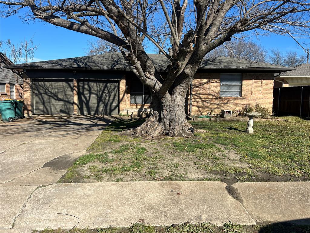 a view of a backyard of a house