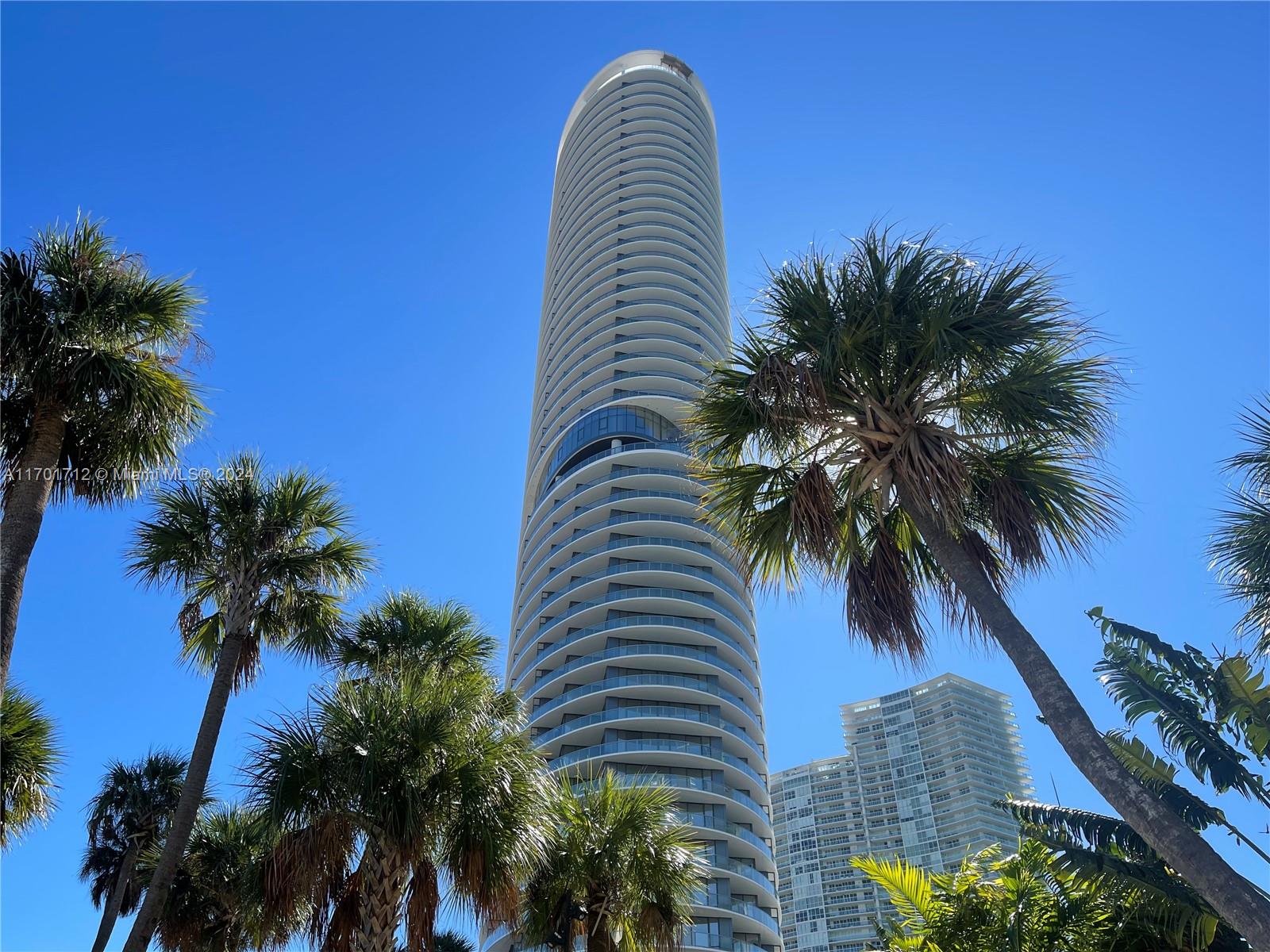 a view of outdoor space with palm trees