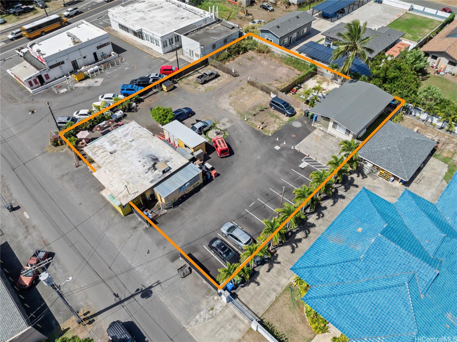 an aerial view of a house with a swimming pool