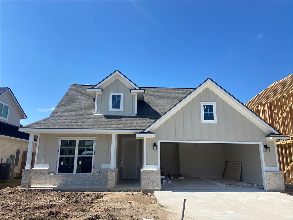 a front view of a house with a garage