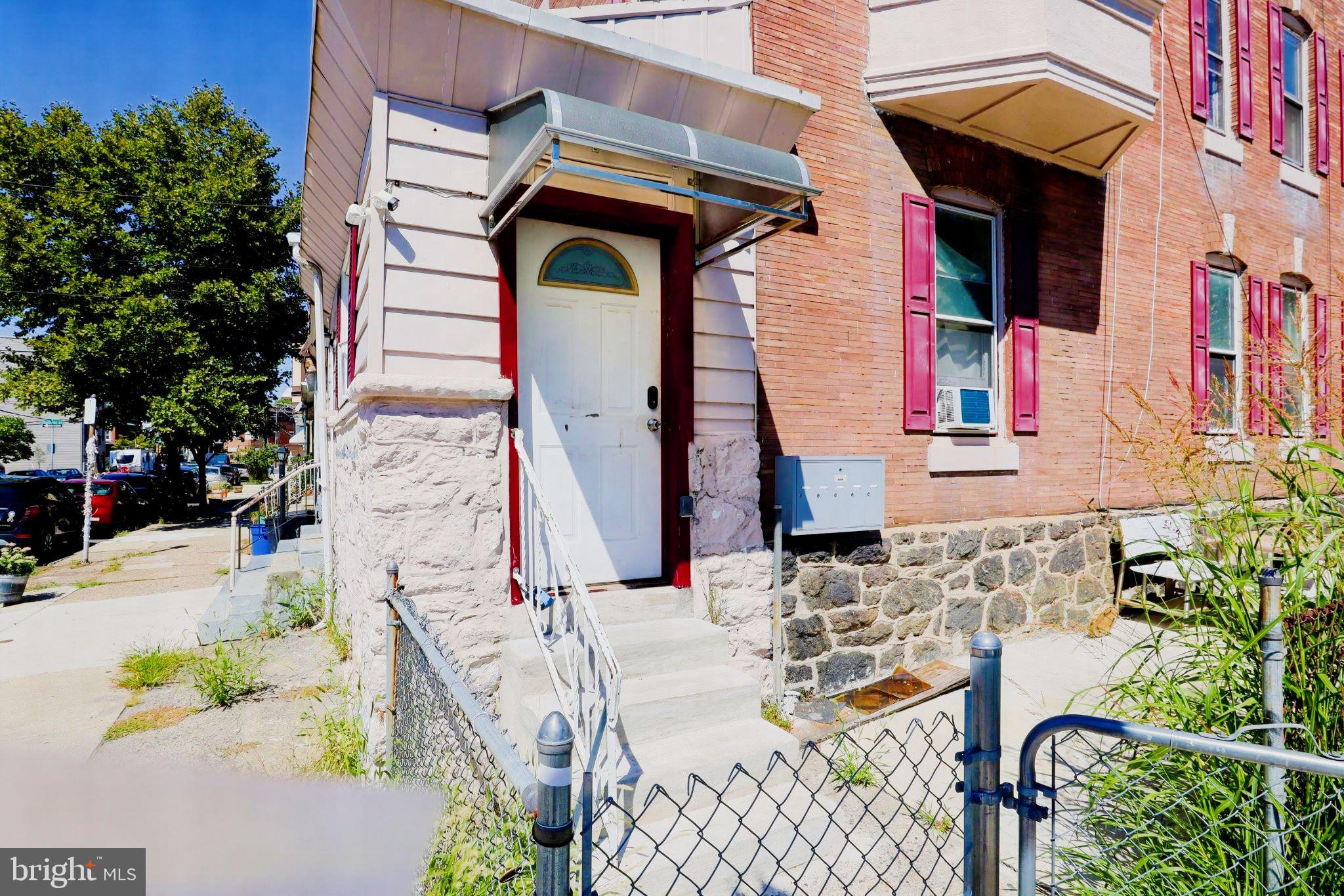 front view of a house with a street