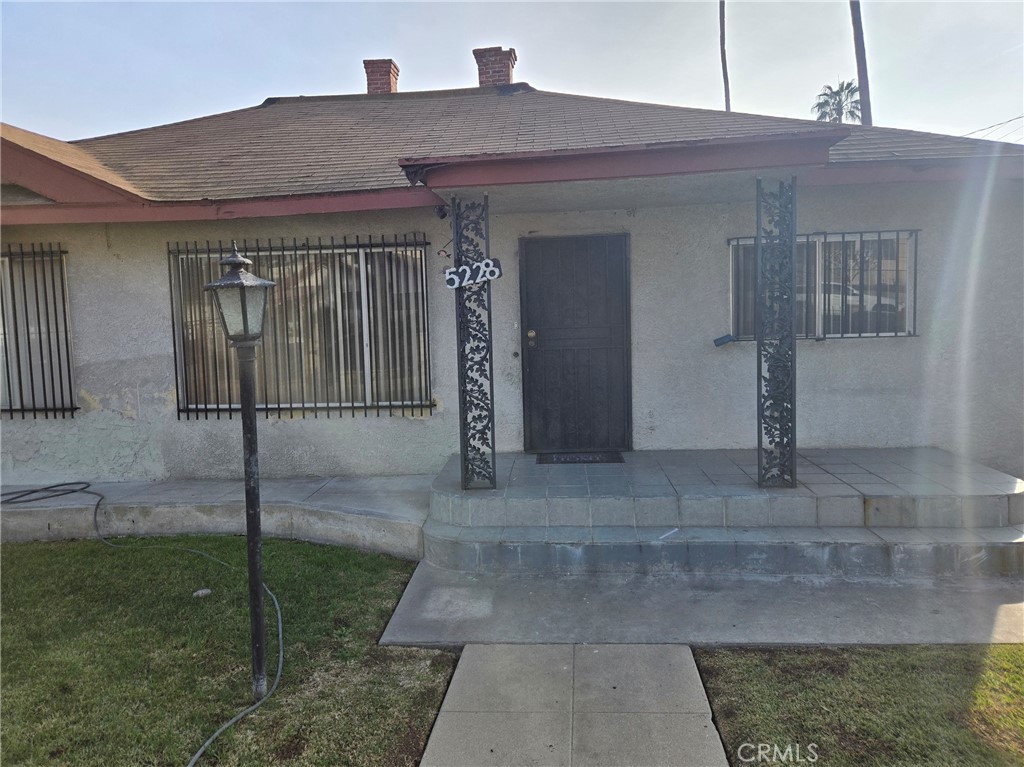 a front view of a house with garage