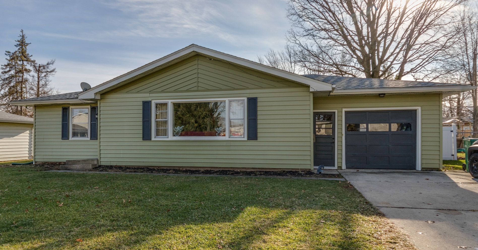 a front view of house with yard