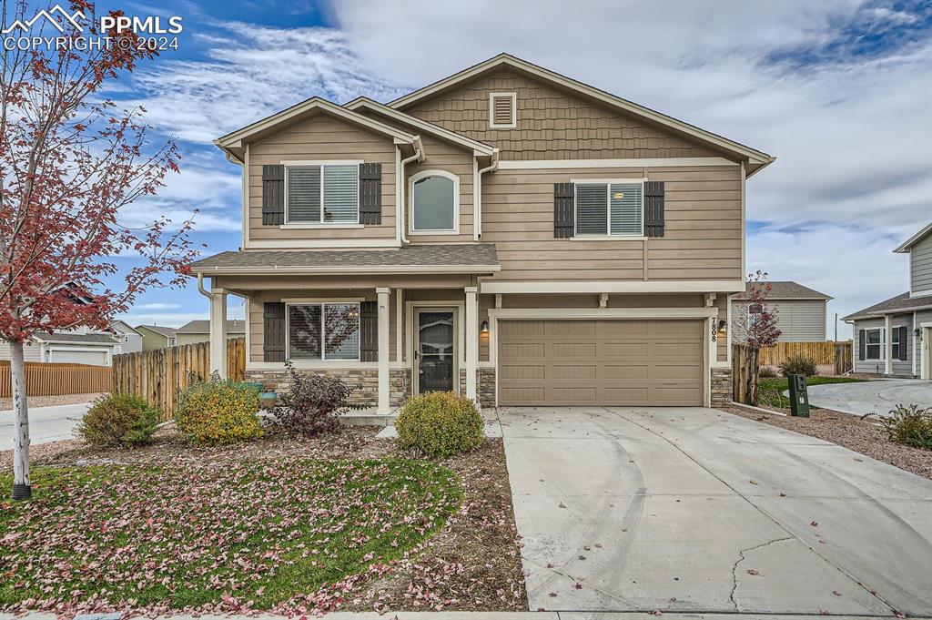 Craftsman-style home featuring a garage