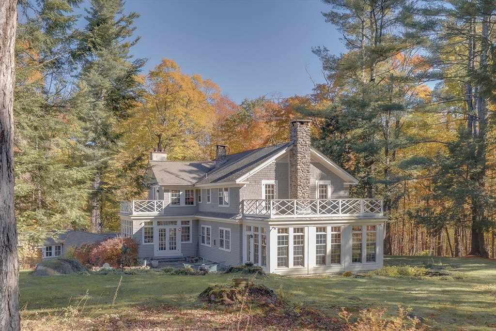 front view of a house with a garden