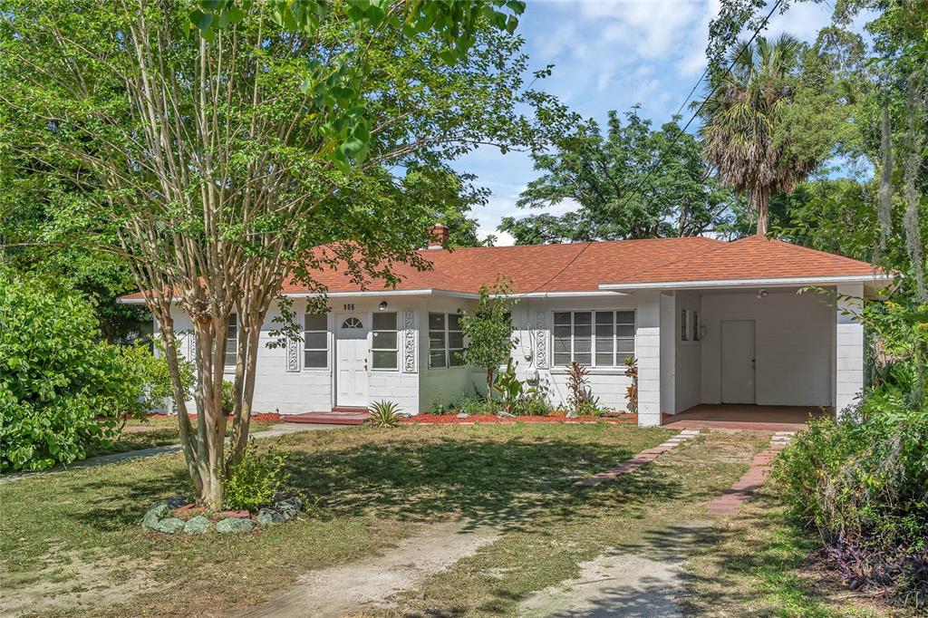 front view of a house with a yard