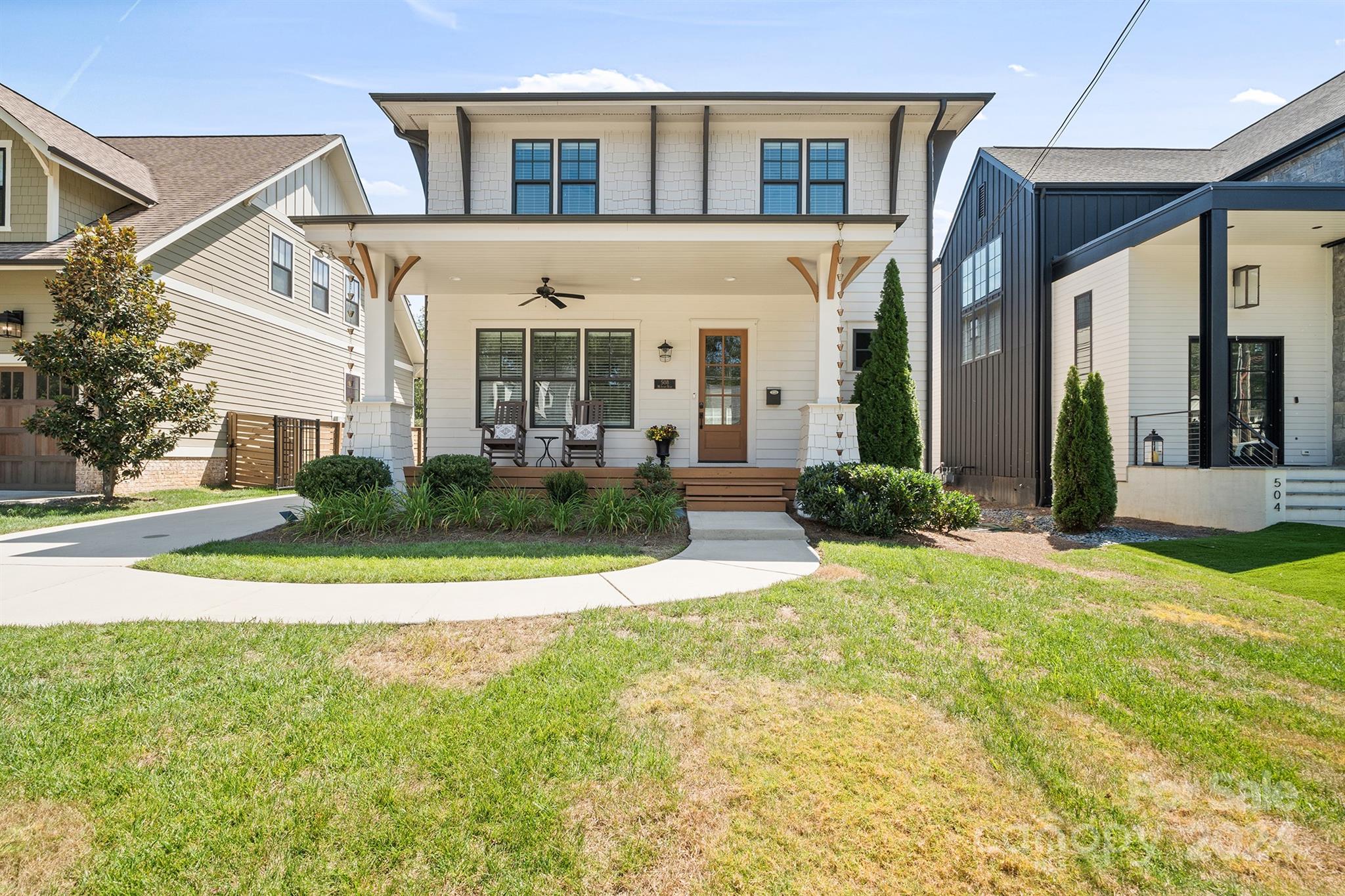 front view of a house with a yard