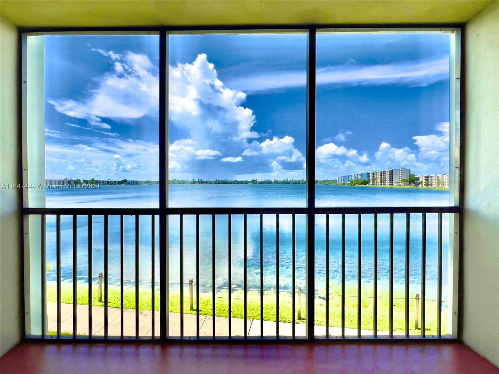 a view of a balcony with furniture