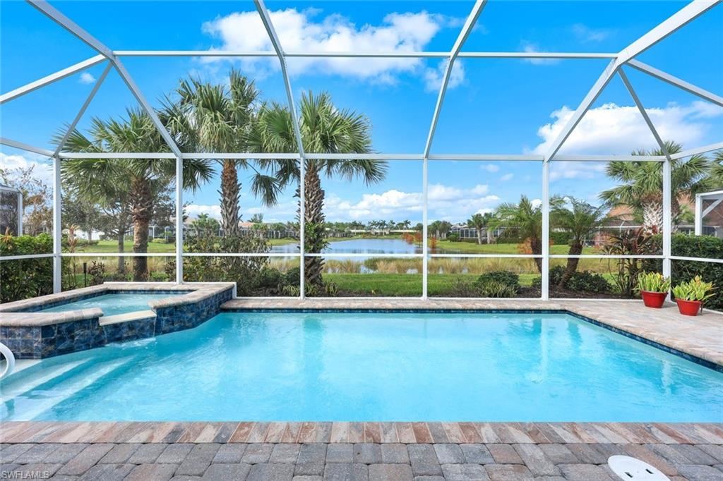 a view of a backyard with swimming pool