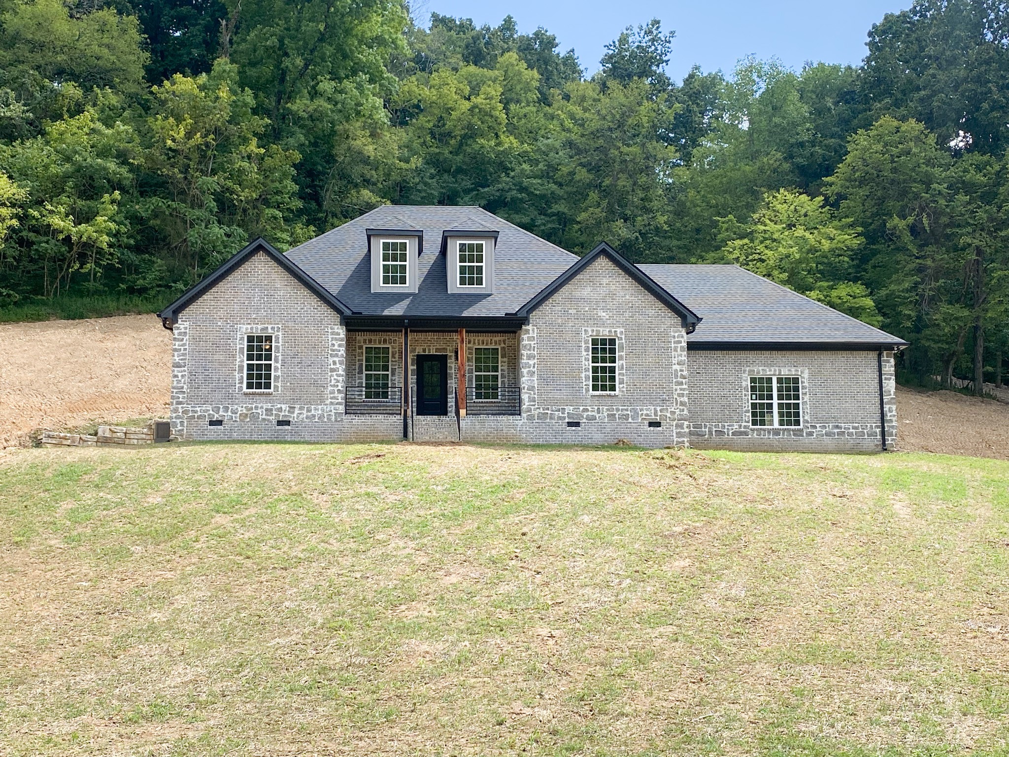 a front of a house with a outdoor space