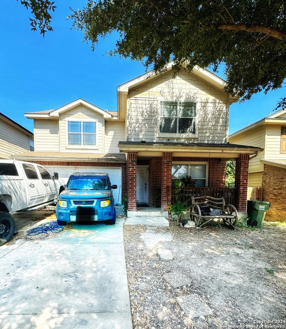 a car parked in front of a house