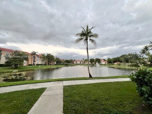 a view of a lake with a big yard