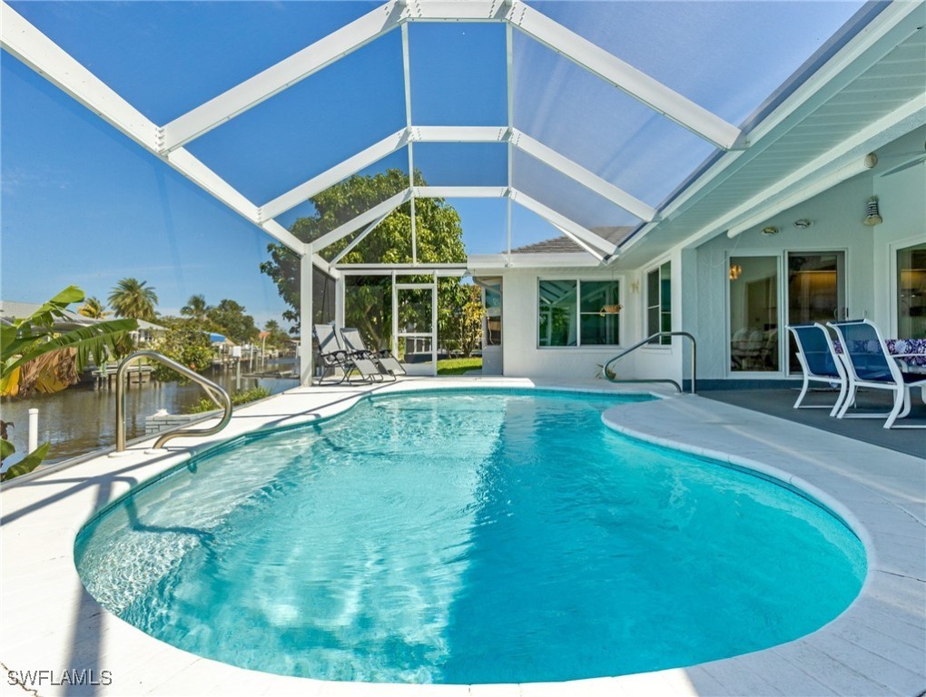 a view of a house with swimming pool