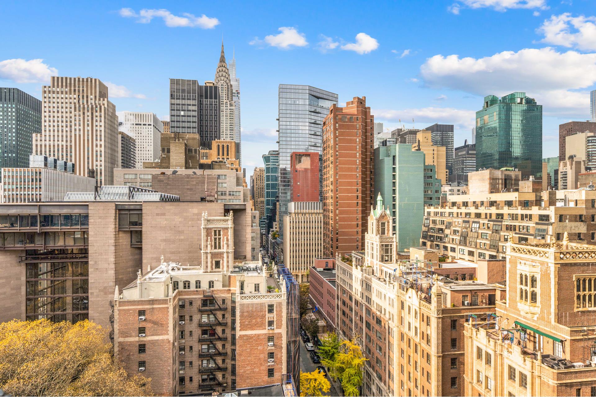 a view of a city with tall buildings