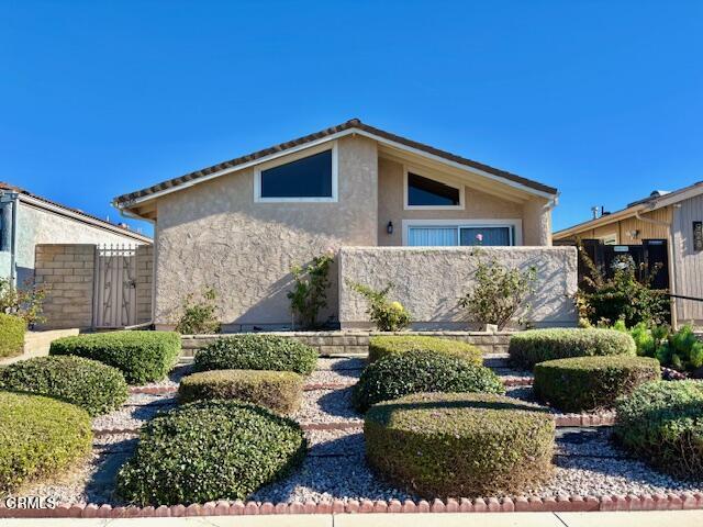 a view of a back yard of the house